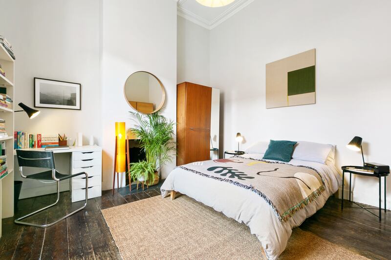 The front room off the left of the hallway. It is currently the main bedroom, but could also be used as a living space or study.