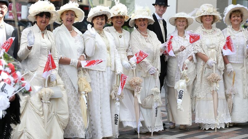 People in period costume wait for the Prince of Wales and the Duchess of Cornwall to arrive for a visit to the English Market in Cork. Photograph:  Brian Lawless/PA Wire
