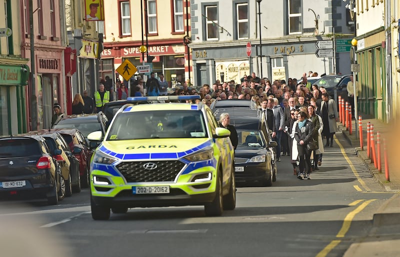 The funeral cortege of Thomas and Eileen Mahon making its way through Swinford. Photograph: Conor McKeown