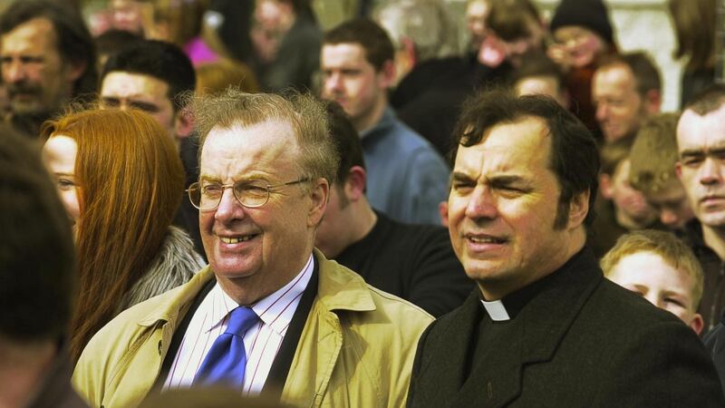 Ivan Cooper with author Don Mullan,  dressed as a priest for a part in the film Bloody Sunday, on the set in Ballymun, Dublin in 2001. Photograph: Frank Miller