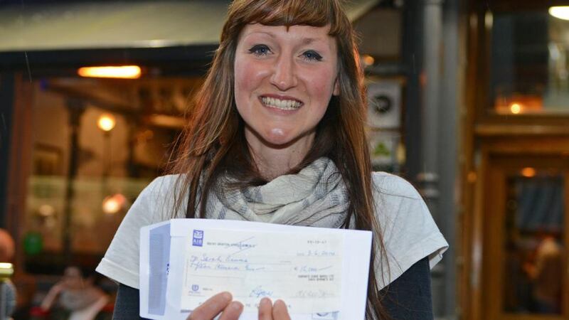 Sara Baume, with her cheque for winning the 2014 Davy Byrne’s Short Story award: “Last summer I won €15,000, a massive sum by everyone’s standards, but as anybody trying to pursue a career in the arts will tell you, it isn’t going to be spent on continental holidays and cutting-edge gadgetry, or central heating for that matter. Every cent goes back into funding new projects, or towards freeing up the time in which to realise them. So long as I’m thrifty, my prize fund can be eked out for the best part of two years of rent, groceries and petrol.” Photograph: Dave Meehan
