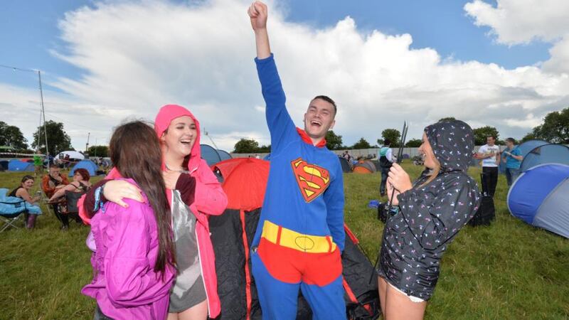 Molly Murphy, Ciara Dalton, Aidan Twomey and Simone Black, from Cork and Dublin, sett, up camp at Punchestown at the start of  Oxegen.  Photograph: Alan Betson