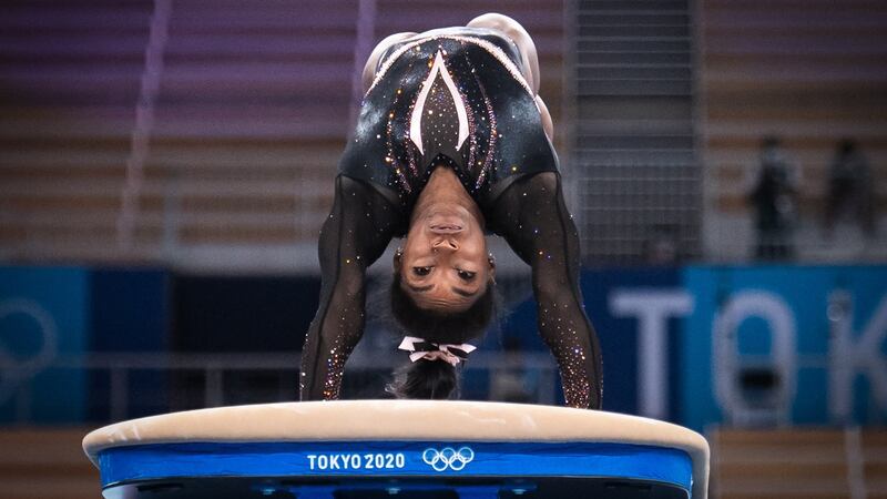 US gymnast Simone Biles practices on the vault during a training session at the Ariake Gymnastics Centre in Tokyo on Thursday,  on the eve of the start of the 2020 Olympic Games. Photograph:  Loic Venance/AFP via Getty Images