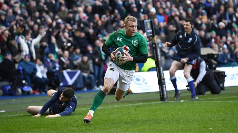 Keith Earls skates in to score Ireland’s third try against Scotland. Photograph: Stu Forster/Getty