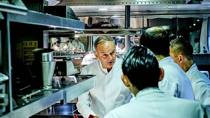 Christian Le Squer, head chef at Le Cinq, with his kitchen brigade. Photograph: Jean-Claude Amiel