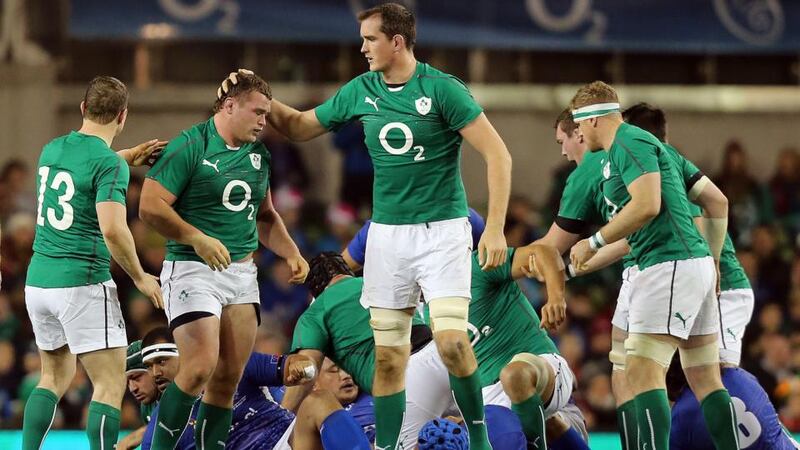 Ireland’s Brian O’Driscoll (l) and Devin Toner (centre) congratulate debutant prop Jack McGrath. Photograph: Colm O’Neill/Inpho