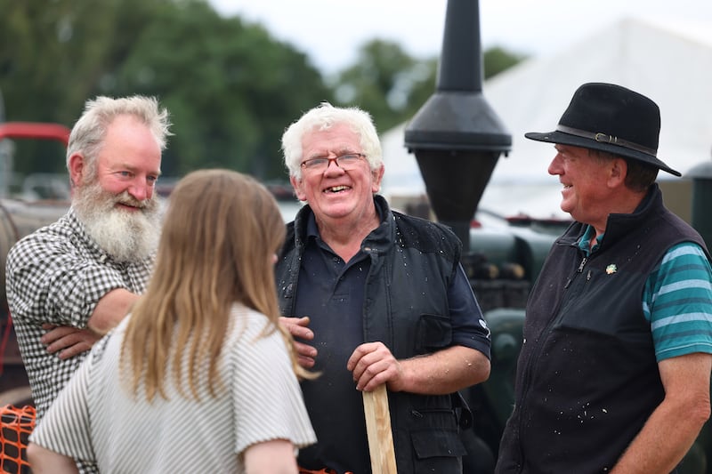 Mike and Kristina Feeney, with Philp Larkin (centre) and Padrig Larkin (right), all from Galway, at the show. Photograph: Dara Mac Dónaill/The Irish Times






