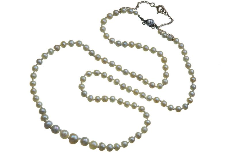 A string of natural (laboratory certified) saltwater pearls with an old mine-cut diamond (€3,850) from Carol Clarke, Dawson St, Dublin