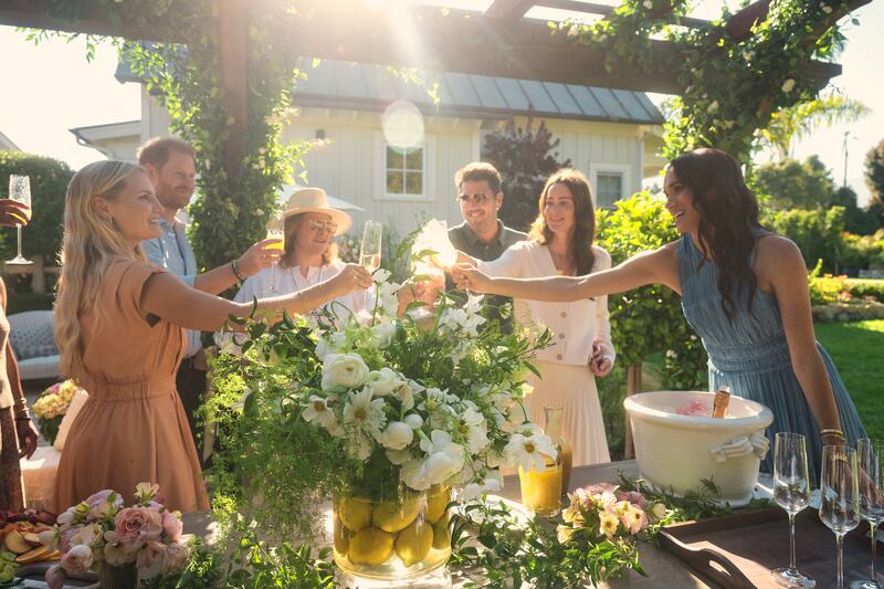 With Love, Meghan: the duchess (right) with Harry (second left) and friends. Photograph: Jake Rosenberg/Netflix