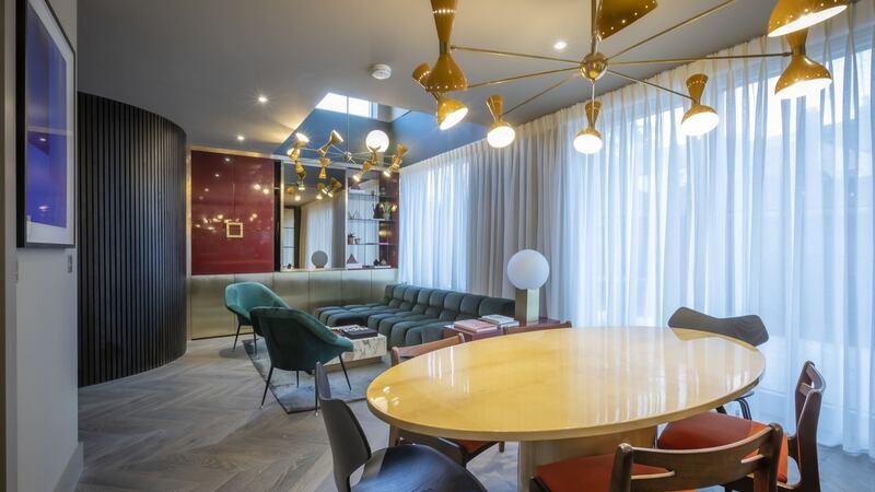 Living and dining area in three-bed home.