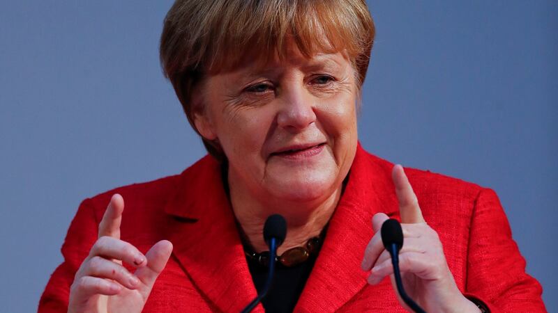 German chancellor Angela Merkel faces and election.