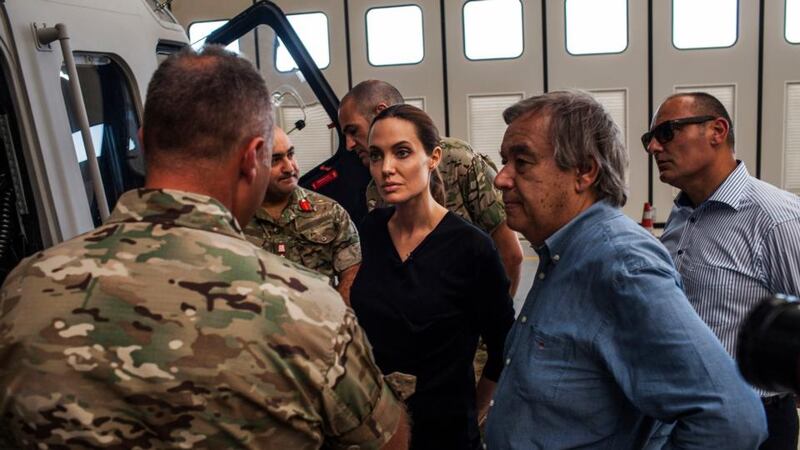 Handout photo dated 14/09/14 issued by UNHCR of Special Envoy for the United Nations High Commission for refugees Angelina Jolie listening to officers in the Maltese military discuss rescue at sea operations for refugees at a military base in Valetta, Malta. Since the start of 2014, more than 2,500 asylum seekers have died trying to cross the Mediterranean. Photograph: PA