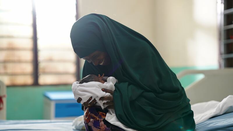 Fadumo Ali Abdi, 30 year old mother of three after giving birth to her baby girl in Luuq hospital, Somalia on 14th May 2023