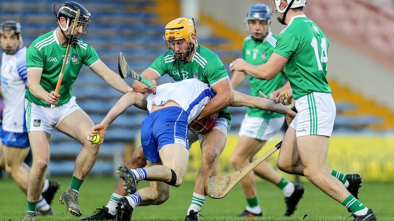 Tadhg de Búrca runs into a wall of Limerick players during the Munster SHC Final against Limerick. Photograph: Laszlo Geczo/Inpho