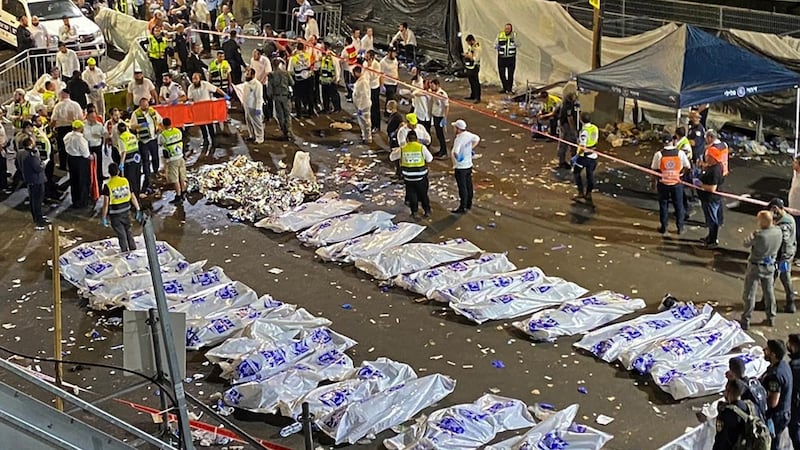 Bodies laid out after the stampede at Mount Meron. Photograph:   Ishay JErusalemite/Behadrei Haredim/AFP via Getty Images