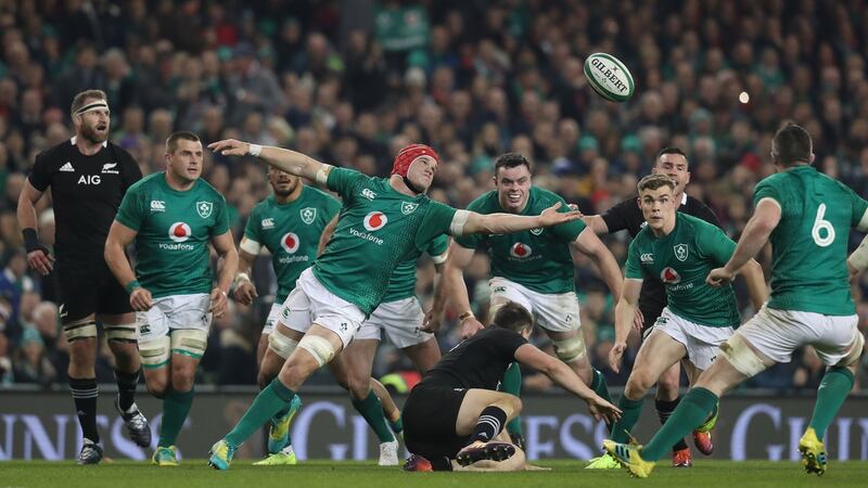 Ireland’s Josh van der Flier reaches for the ball against New Zealand at the Aviva. Photograph:  Billy Stickland/Inpho
