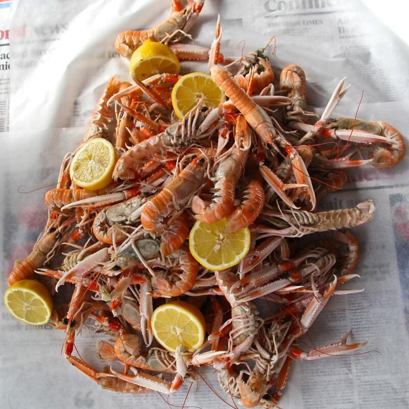Poached Dublin Bay prawns with wild-garlic butter