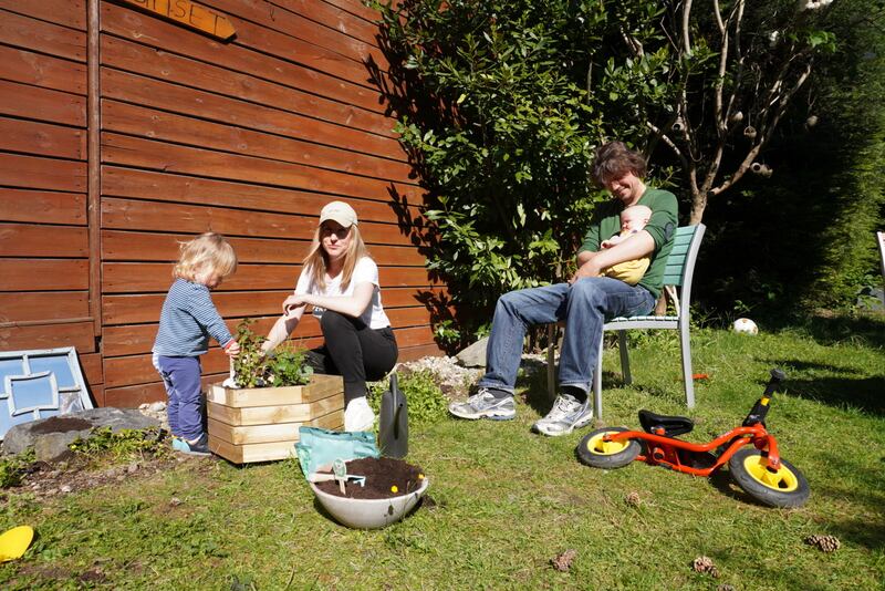Méabh McMahon and Philipp Weber with their son Seán (2) and baby Tess at their home in Brussels.
