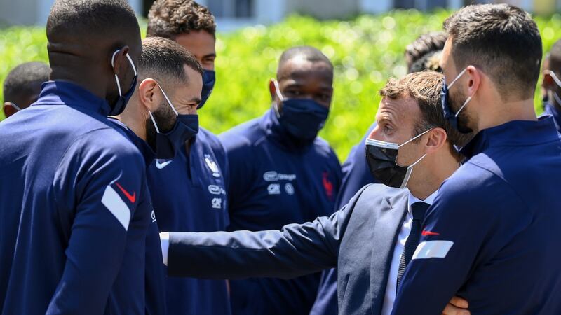 French president Emmanuel Macron with Benzema at the France training camp. Photo: Franck Fife/EPA
