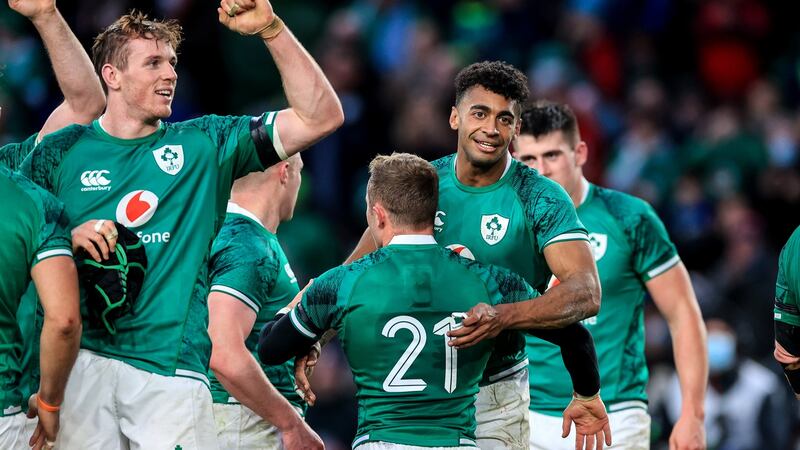 Ryan Baird, Craig Casey and Robert Baloucoune celebrate at the final whistle. Photo: Billy Stickland/Inpho