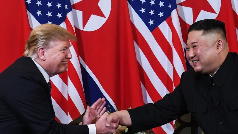 US President Donald Trump and  North Korea’s leader Kim Jong Un  at the Sofitel Legend Metropole hotel in Hanoi Photograph: Saul LOEB/AFP/Getty