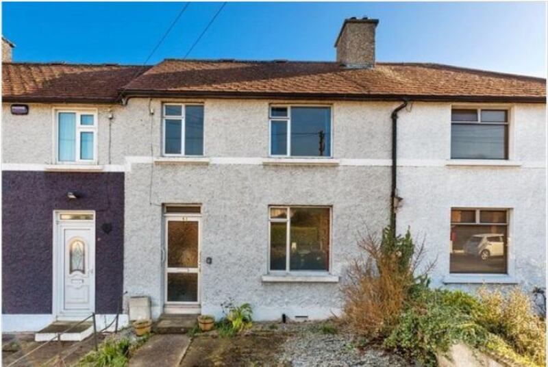 51 Ferguson Road, Drumcondra, Dublin 9: On the ground floor are two living rooms with fireplaces and a dining room with kitchen off it