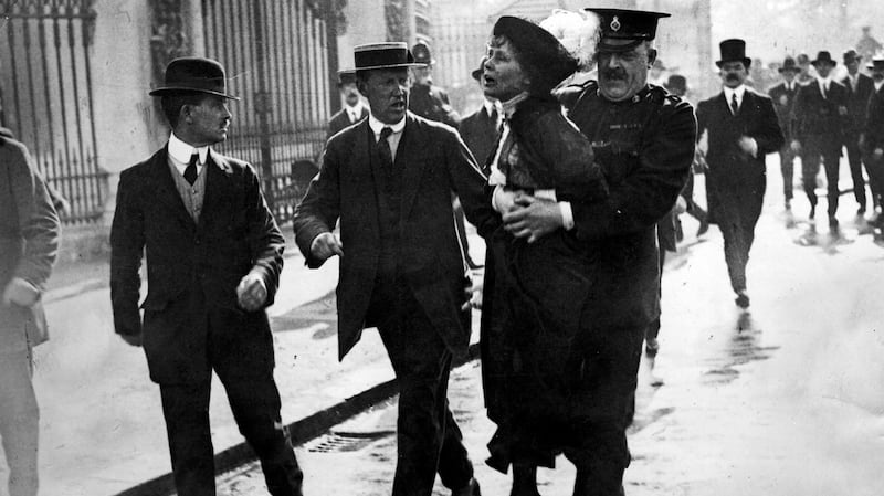 English suffragette Emmeline Pankhurst (1858 - 1928), is arrested at a demonstration outside Buckingham Palace, London. Photograph: Jimmy Sime/Getty Images