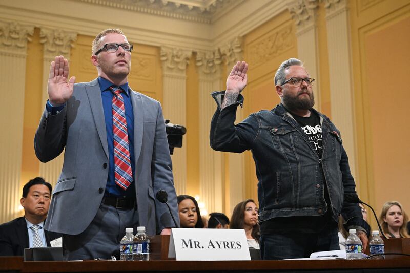 Former Oath Keepers spokesman Jason Van Tatenhove (right); and Stephen Ayres, who has pleaded guilty to entering the Capitol illegally on January 6th, are sworn in before giving evidence to the January 6th committee on Tuesday. Photograph: Saul Loeb/AFP via Getty Images