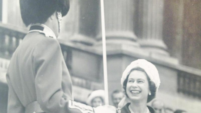 Aylmer with Queen Elizabeth at a presentation of new colours in 1966.
