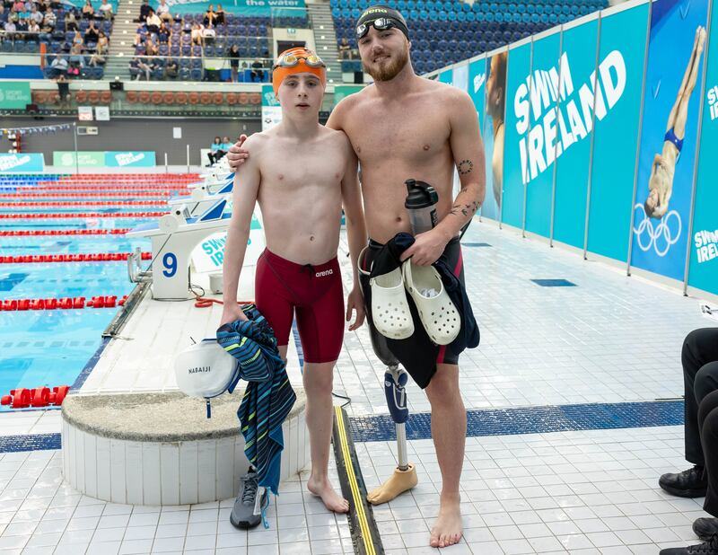 Luke O'Donoghue and Barry McClements after competing in the 100m Backstroke at the Irish Open Swimming Championships & Olympic Trials at the National Acquatic Arena. Photograph: Morgan Treacy/Inpho 