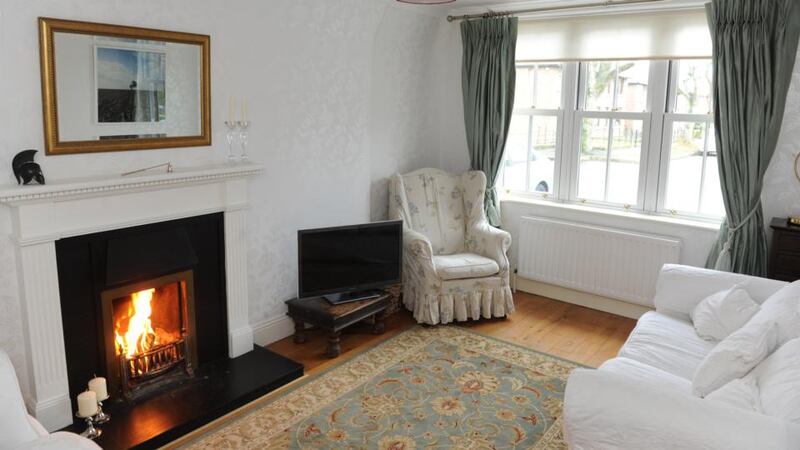 The current owners of 98 Iveagh Gardens reinstated a fireplace in the sitting room.