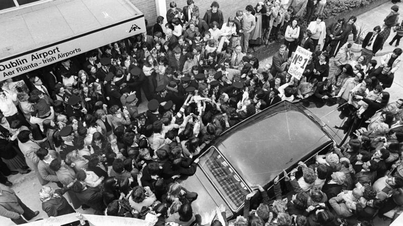 Forty years ago: Crowds surround Logan’s car at Dublin Airport after winning Eurovision in 1980. Photograph: Pat Langan