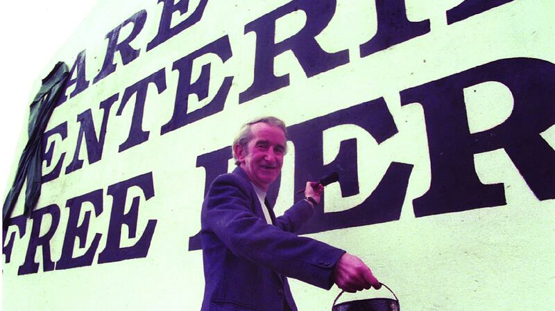 John “Caker” Casey touching up his gable handiwork. Photograph: courtesy of Guildhall Press