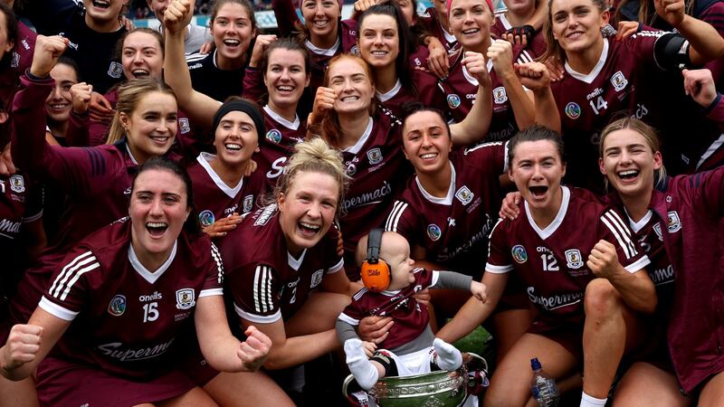 The Galway team celebrate with the O’Duffy Cup at Croke Park. Photograph: James Crombie/Inpho