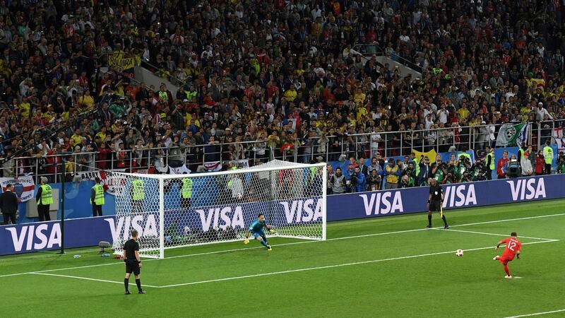 Kieran Trippier scores England’s fourth penalty against Colombia. Photograph: Alex Morton/Getty