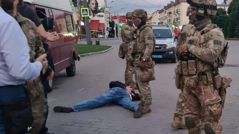 A handout photo made available by the Ukrainian police press office shows security forces detaining an alleged hijacker (lying on ground) following the release of hostages from a hijacked bus in the downtown area of the city of Lutsk, western Ukraine on July 21st. Photograph: Ukrainian police press office/EPA