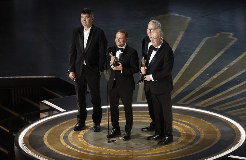 Oscars 2023: Richard Baneham (second left) with Eric Saindon, Daniel Barrett and Joe Letteri, who together won the Academy Award for best visual effects for Avatar: The Way of Water. Photograph: Etienne Laurent/EPA