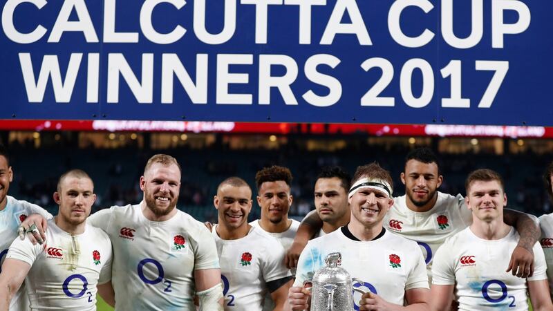 England’s Dylan Hartley and team-mates celebrate with the Calcutta Cup after victory over Scotland at Twickenham. Photograph: Stefan Wermuth/Livepic/Reuters