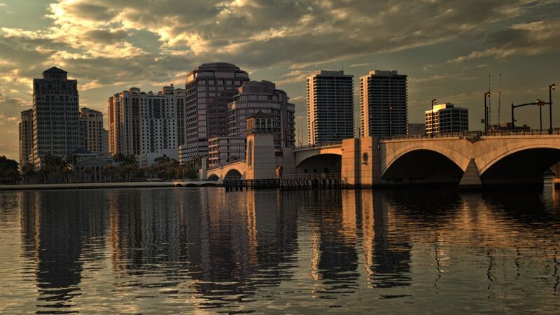 West Palm Beach skyline at sunset photographed from Palm Beach island. Photograph: Michele Eve Sandberg/Corbis via Getty Images
