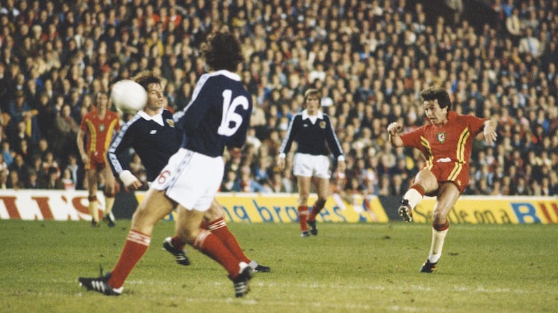 Brian Flynn gets a shot away during the 1978 qualifier between Wales and Scotland at Anfield. Photograph: Allsport/Getty Images