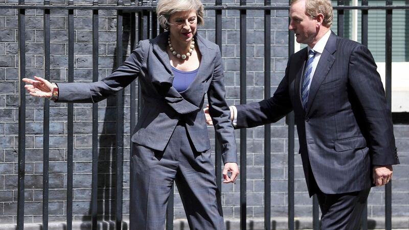 Britain’s prime minister Theresa May (L) greets  Taoiseach Enda Kenny in Downing Street in London. Photograph:Neil Hall/Reuters