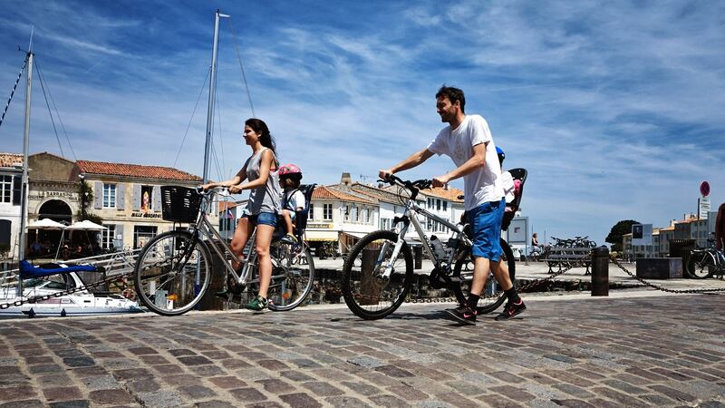 Cycling on the cobblestoned harbour at St Martin-De-Ré