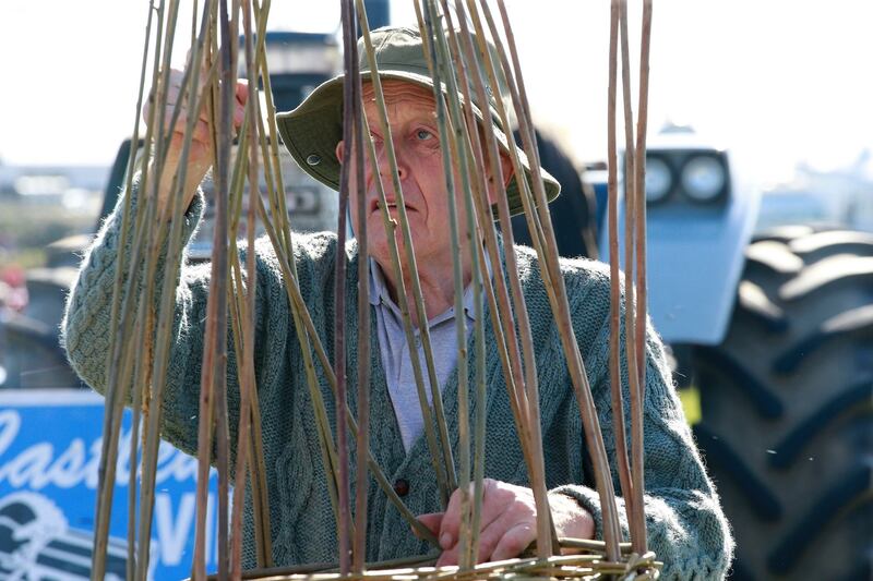 Basket maker John Mulderrig, from Offaly, displays his traditional skills. Photograph: Nick Bradshaw