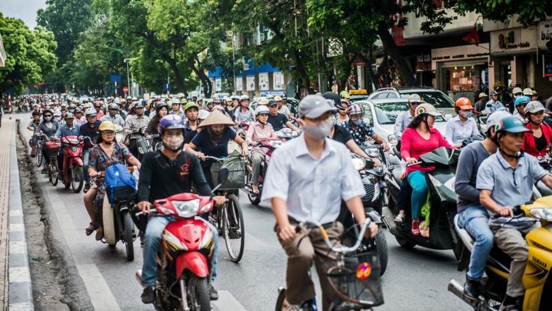 A bustling street in Hanoi. Photograph: Justin Mott/Bloomberg