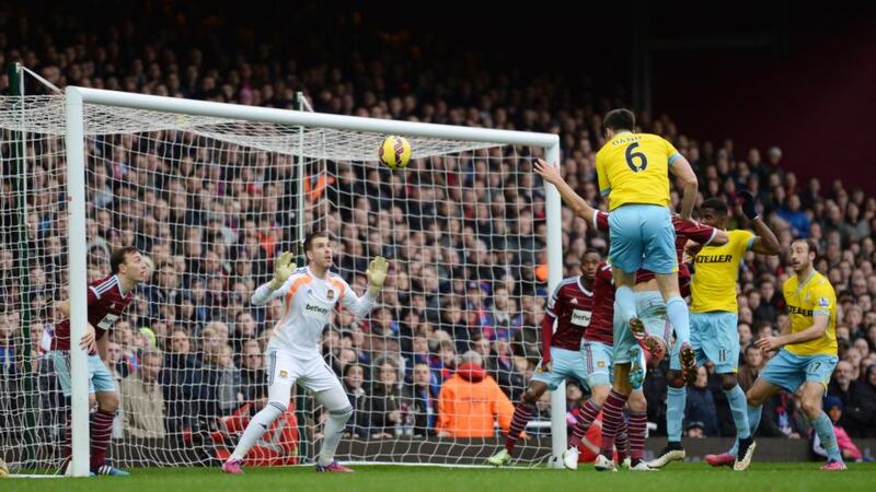 Scott Dann heads home Crystal Palace’s second goal in the Premier League   game against West Ham at Upton Park. Photograph:  Tony O’Brien/Action Images via Reuters /Livepic