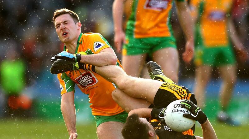 Dr Crokes’ John Payne kicks Dylan Wall and is subsequently sent off. Photograph: James Crombie/Inpho