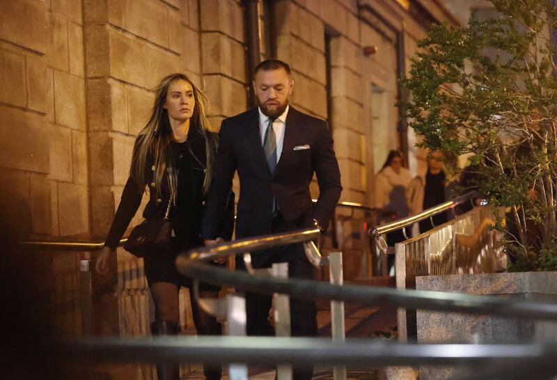 Conor McGregor leaving the Four Courts in Dublin with his partner Dee Devlin after the civil case taken by Nikita Hand. Photograph: Alan Betson

