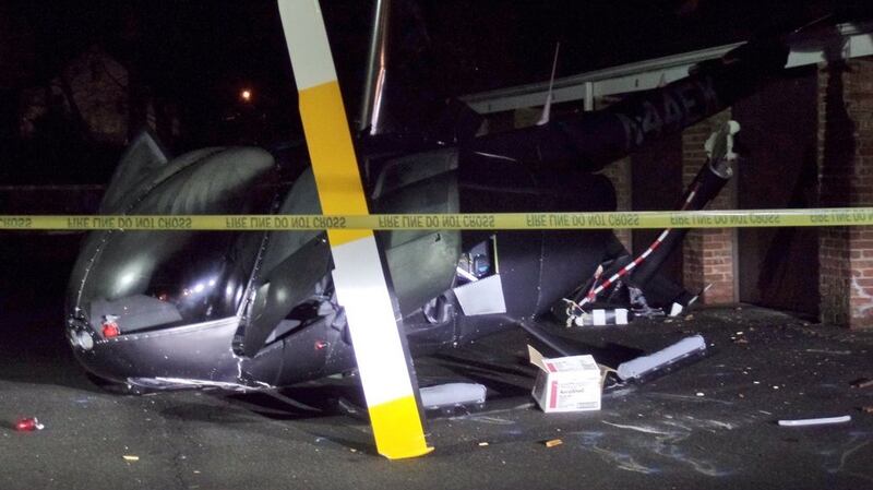 The scene of a helicopter crash in a car park at an apartment complex in Chatham, New Jersey last week. The helicopter was being flown by Co Mayo native Joe Walsh when it crashed. Photograph: Marcus Solis via Twitter
