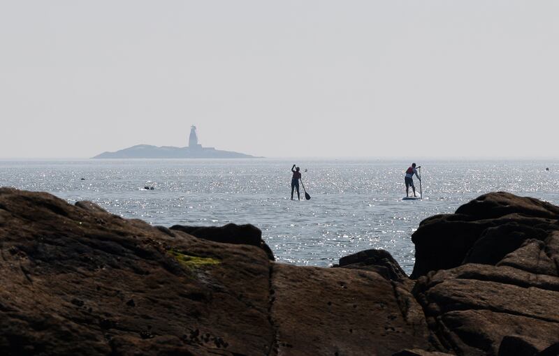 Sup boarders off the coast at Sandycove, Dublin on Wednesday.  Photograph Nick Bradshaw