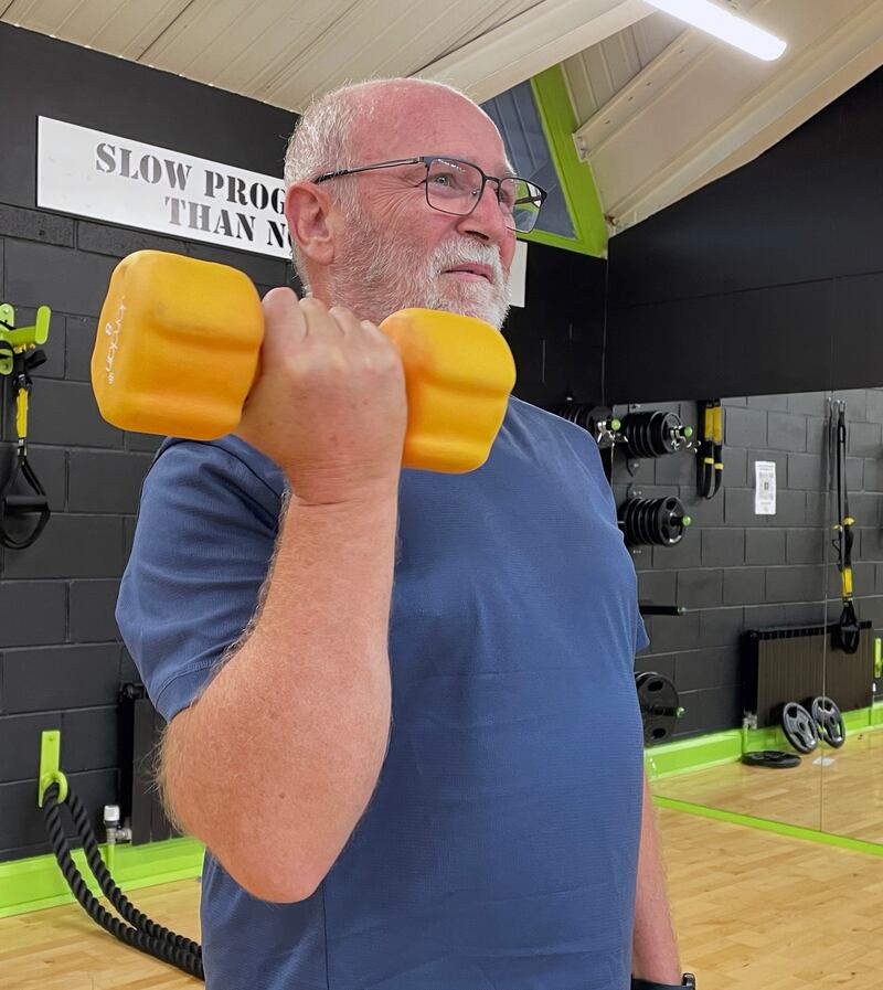 Dave O'Brien (63) of Raheny lifts a dumbbell at Fitbug Fitness Studio. His brother John convinced him to go to the gym. 'I had got to the stage where I was buying slip-on shoes because I couldn’t bend down to tie my laces.' Photograph : Dominique Farrell
